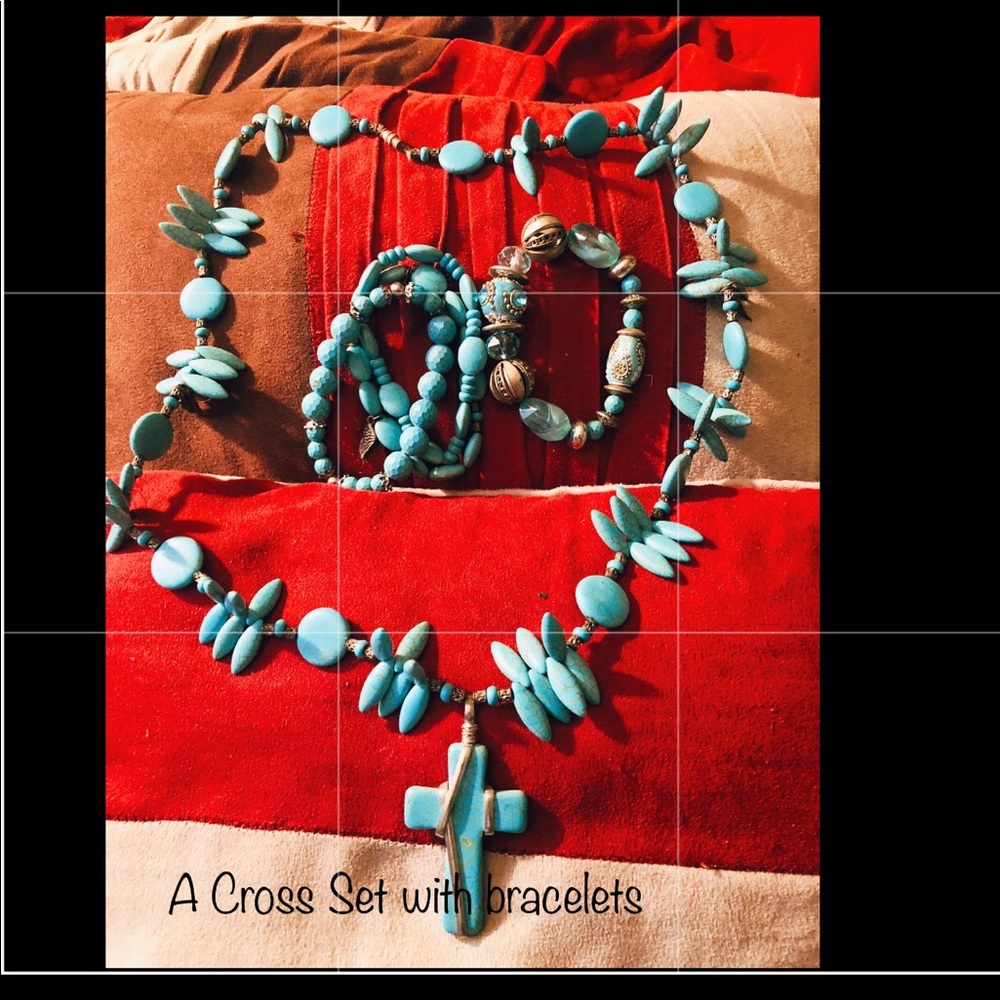 A Cross necklace necklace with matching bracelets